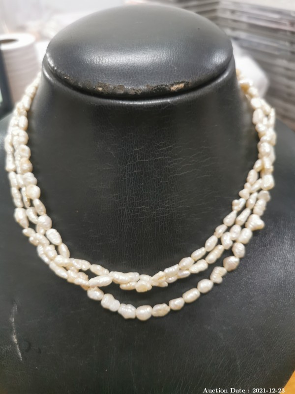 150 - Triple Strand of Freshwater Pearls