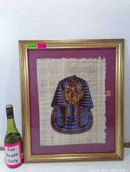 Description Lot 5926 - Framed Tutankhamen Mask on Papyrus