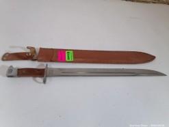 Description Lot 5999 - Long Dagger with Leather Sheath
