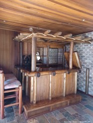 Description Lot 2000 - Full Wooden Bar with Stools & Storage Space