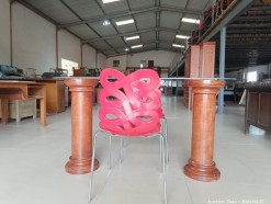 Description 5592 - Glass Top Table with 2 Round Pillars and 2 Composite Red Chairs