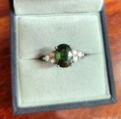 Description 4165 - Platinum Ring with Teal Green Sapphire and 6 diamonds